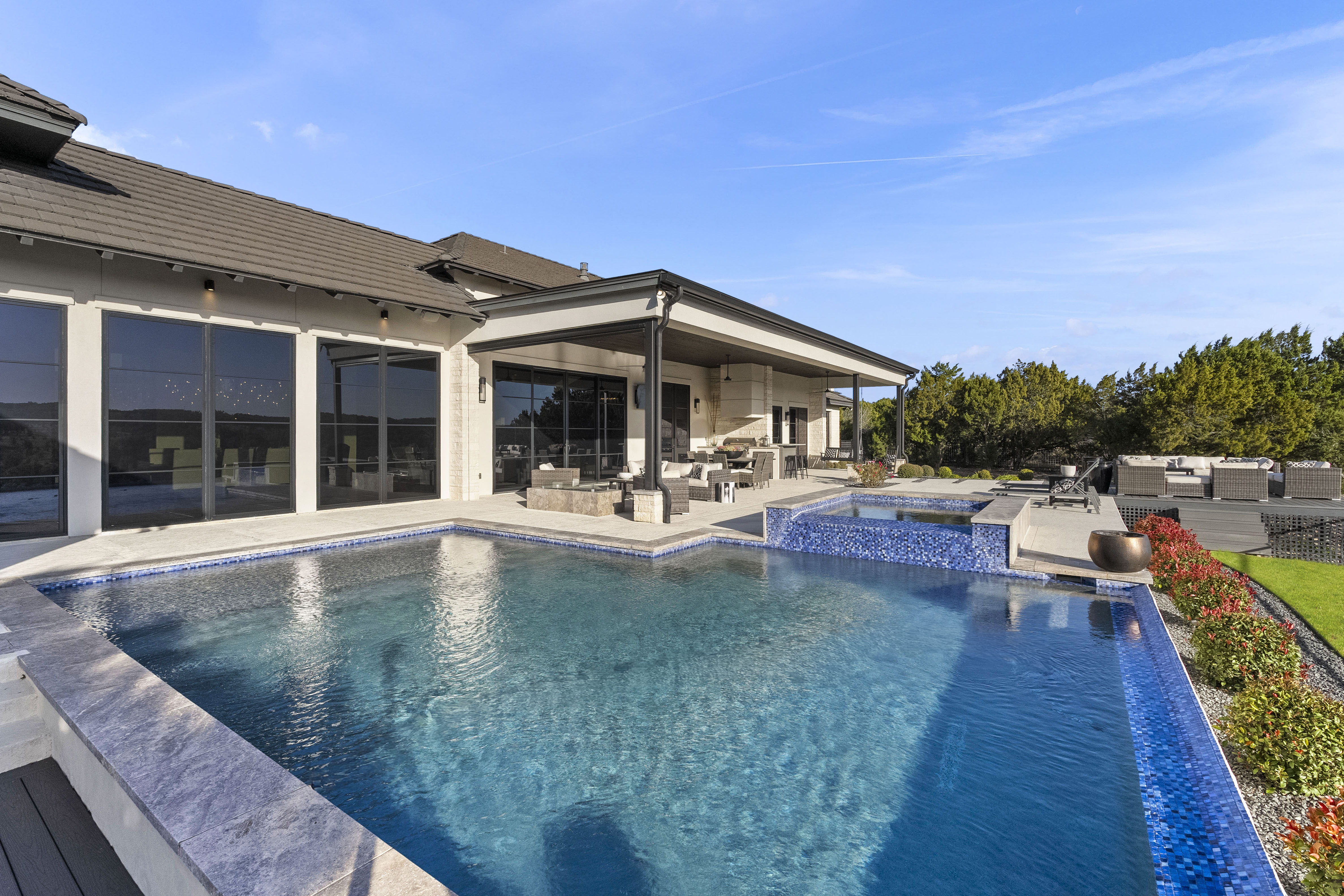 Luxury pool and outdoor entertaining area at a San Antonio residence