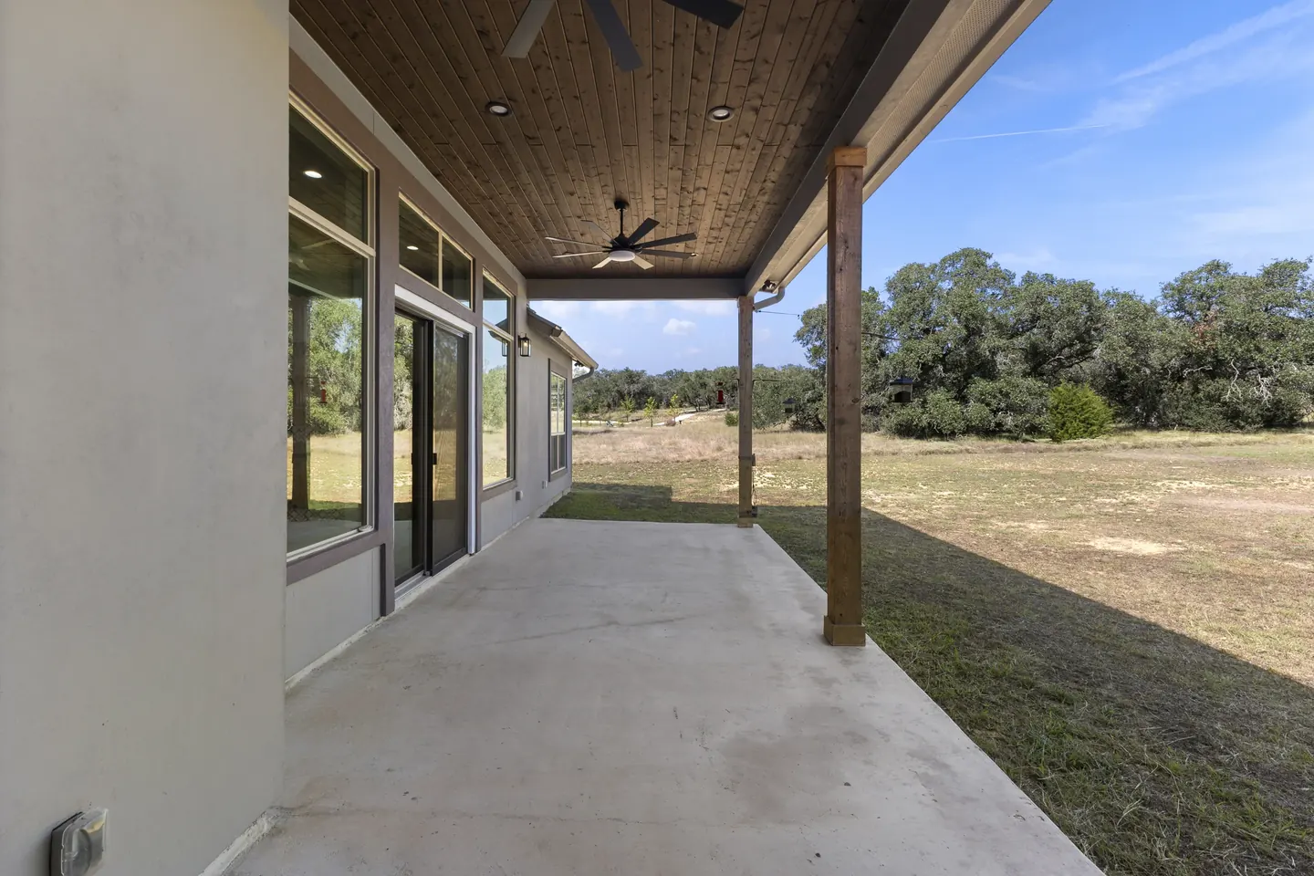 Covered rear porch overlooking the grounds at 924 Annabelle Avenue
