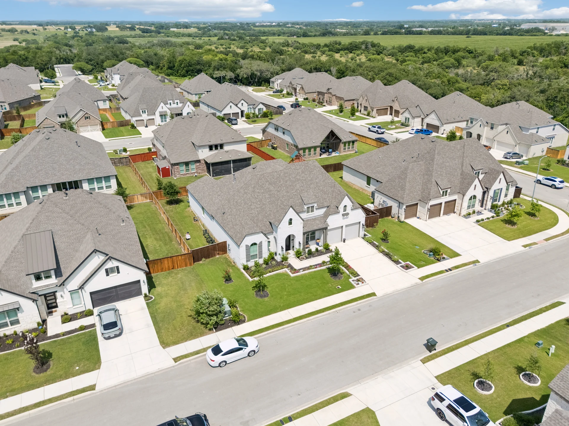 Aerial showing 6826 Hallie Loop among the neighboring homes in Hallies Cove